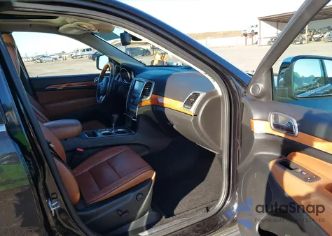 2012 Jeep Grand Cherokee Overland из США, поврежденный, VIN 1C4RJECG3CC281868